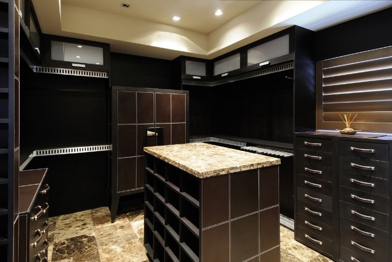 black motif custom-made wardrobes in Cardiff with island table