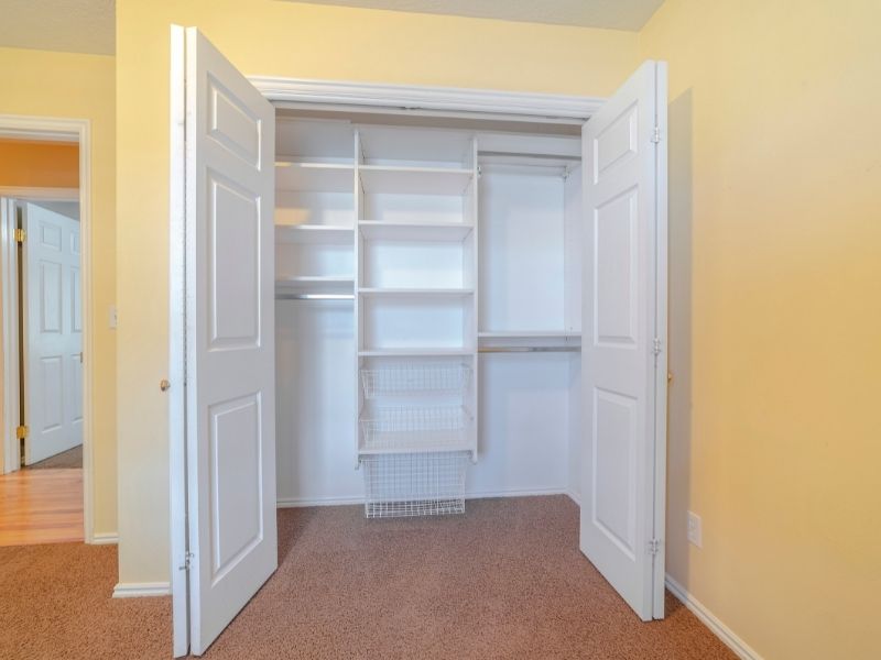 all white wardrobe area by expert wardrobe makers