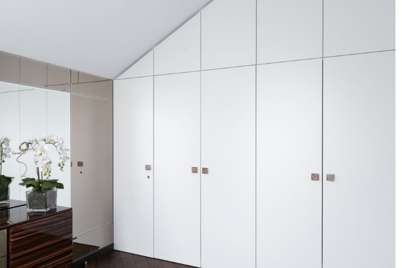 Built-in wardrobe design with hinged doors