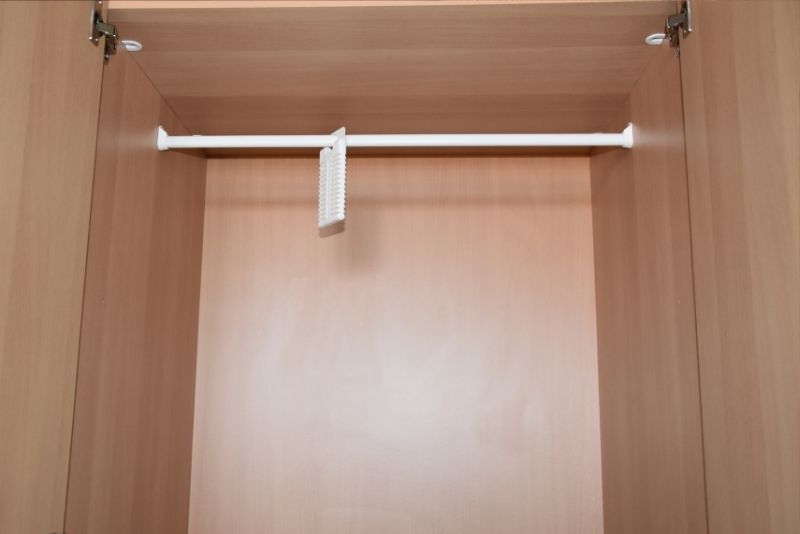 Brown hinged door wardrobe